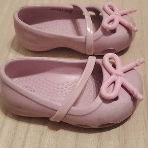 Pink crocs
